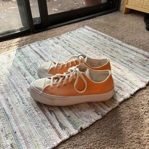 orange and cream low top platform converse